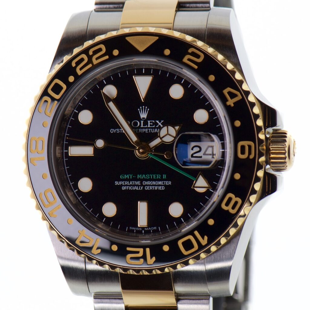 Rolex GMT Master 2 18K YG & SS 40mm Ref 116713LN — photo 1