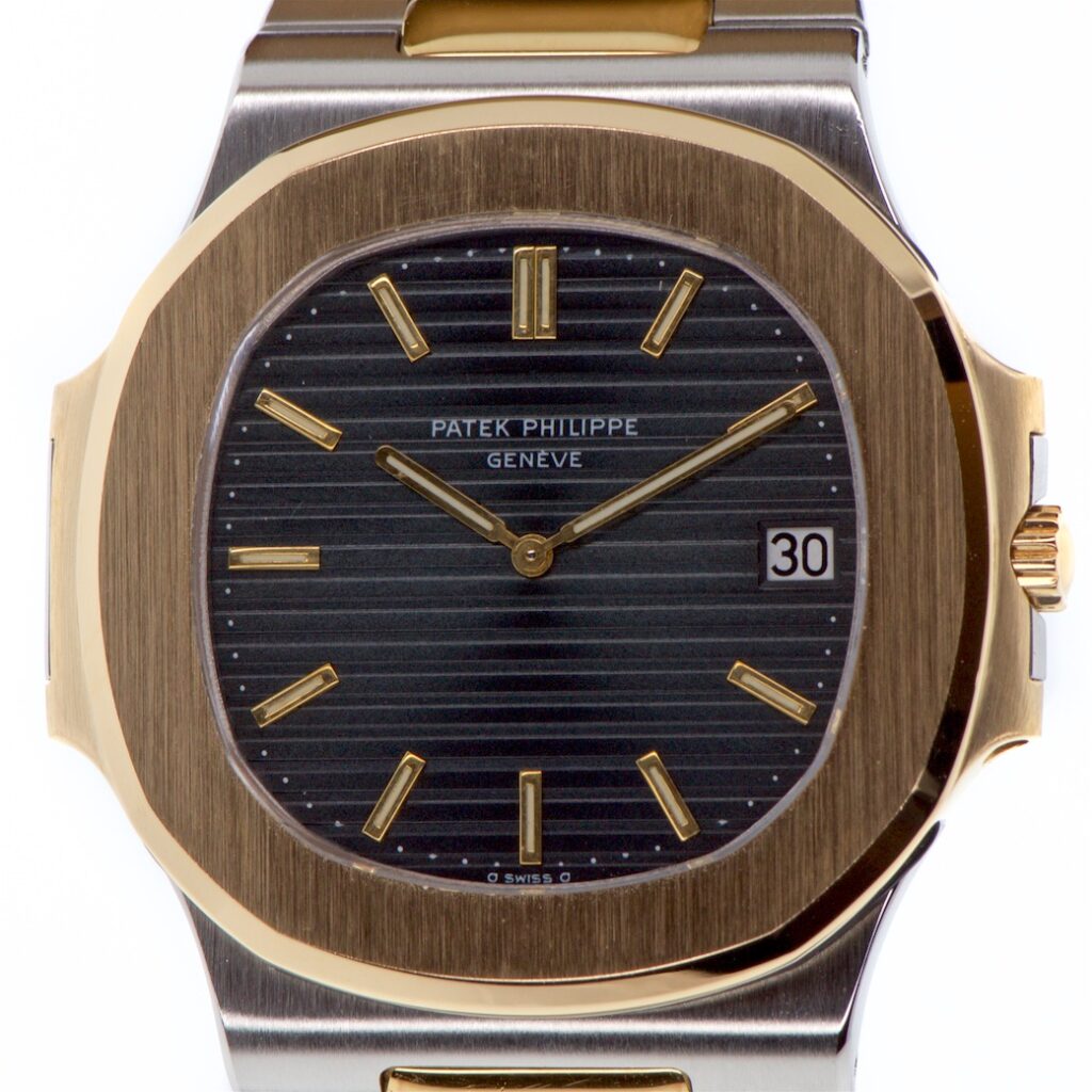 Patek Philippe Nautilus 3700 11 18K Yellow Gold & Steel — photo 1