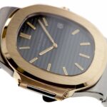 Patek Philippe Nautilus 3700 11 18K Yellow Gold & Steel — photo 9
