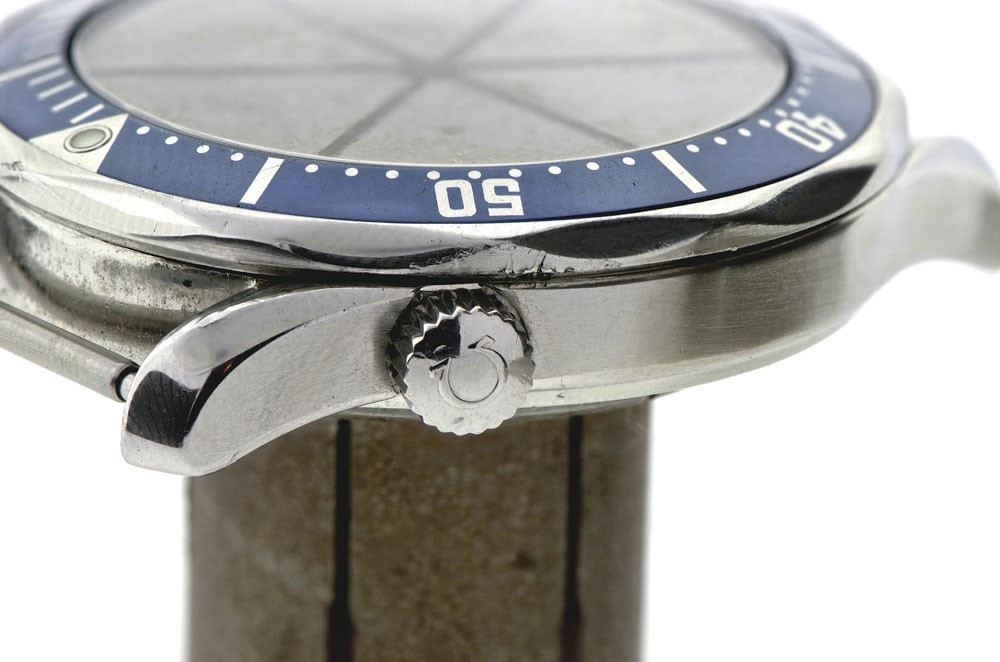 Omega crown side before