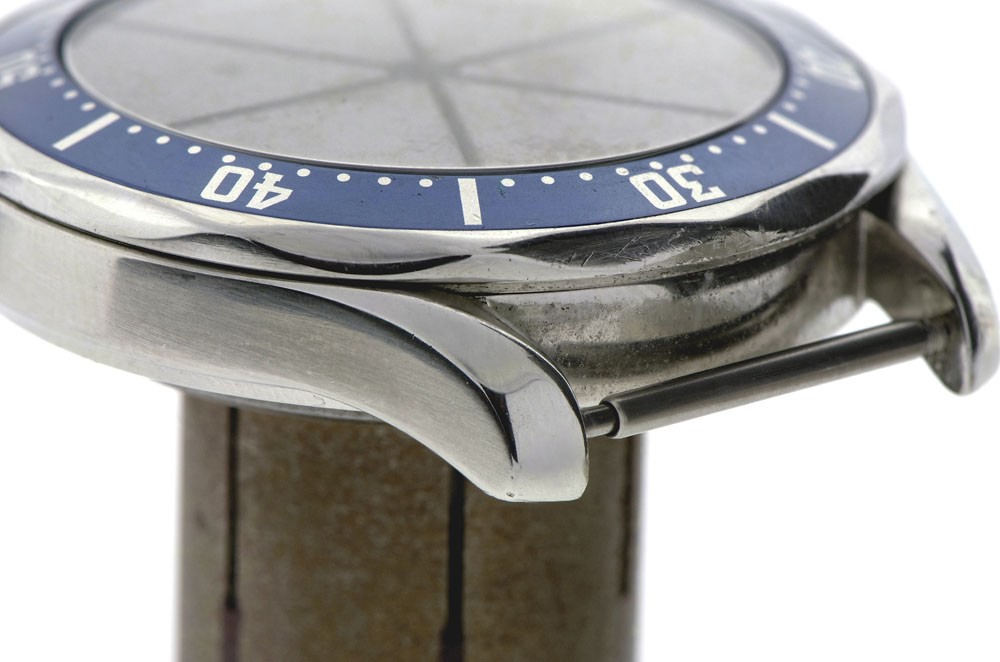 Omega bezel before