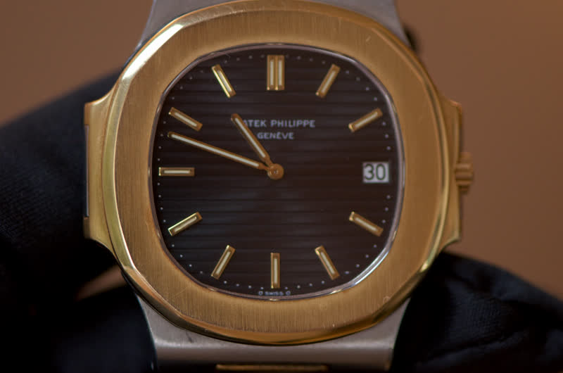 Patek Philippe Nautilus 3700/8 as it arrived, bezel brushing worn away
