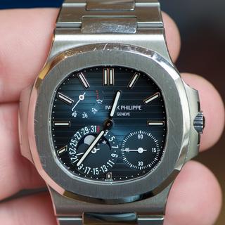 Patek 5712 bezel with a heavy ding, before the refill